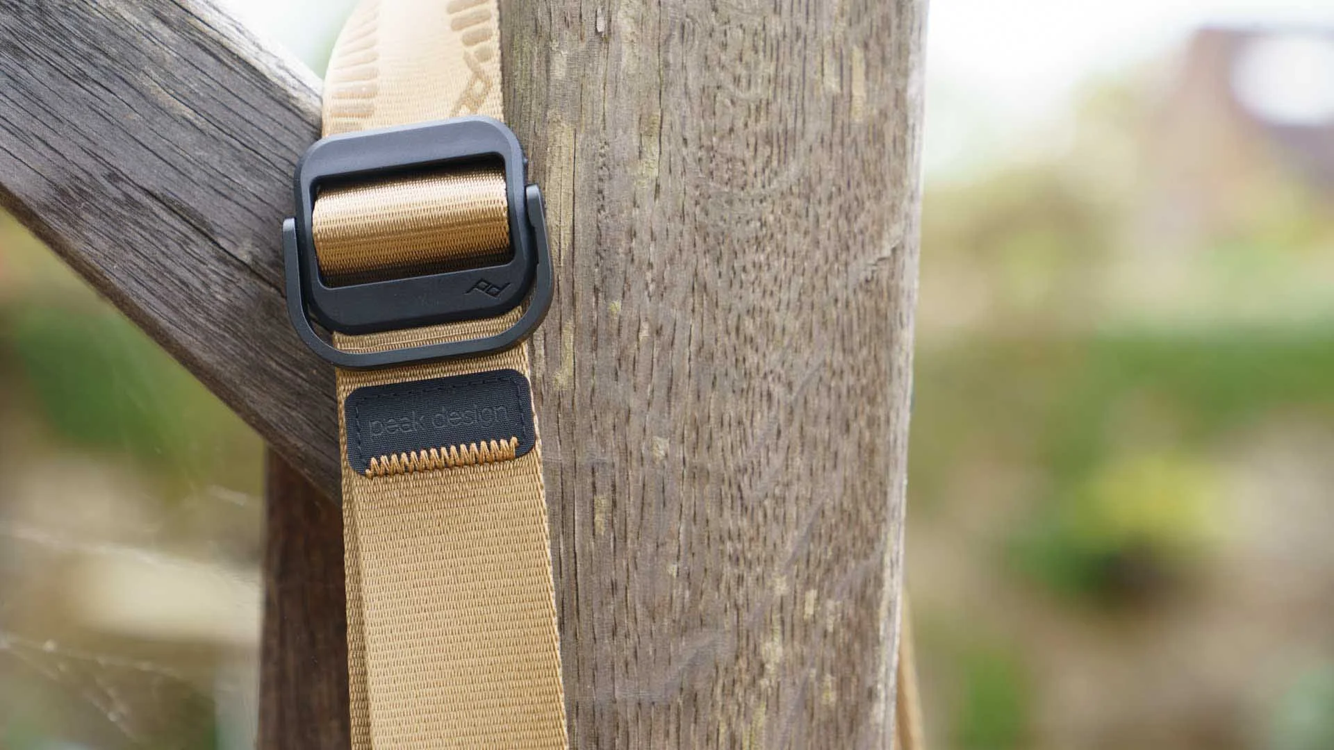  There are two length adjusters on the strap. 