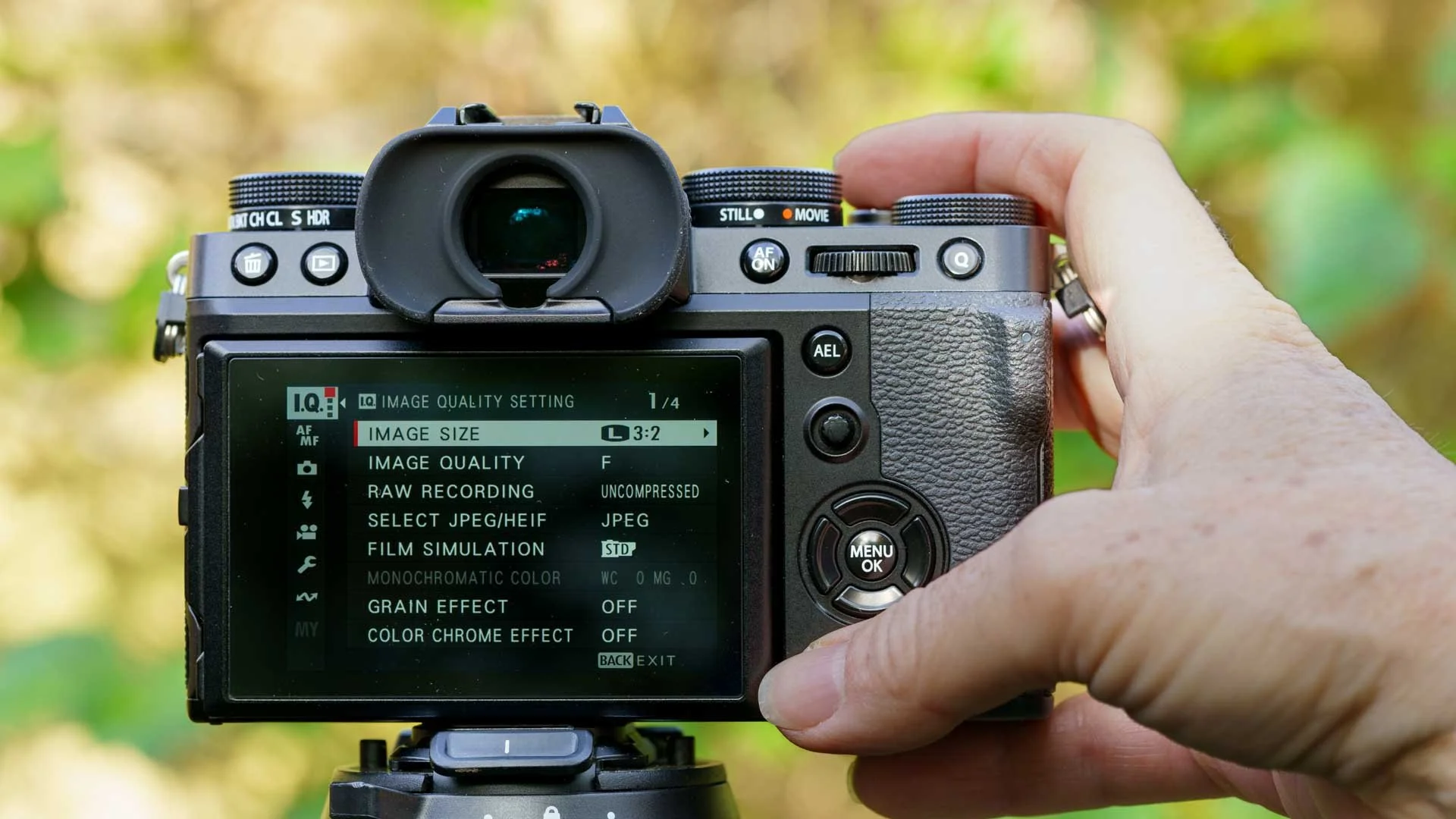  Even with my finger on the shutter release of teh Fujifilm X-T5, I can reach the Display / Back button with my thumb. 