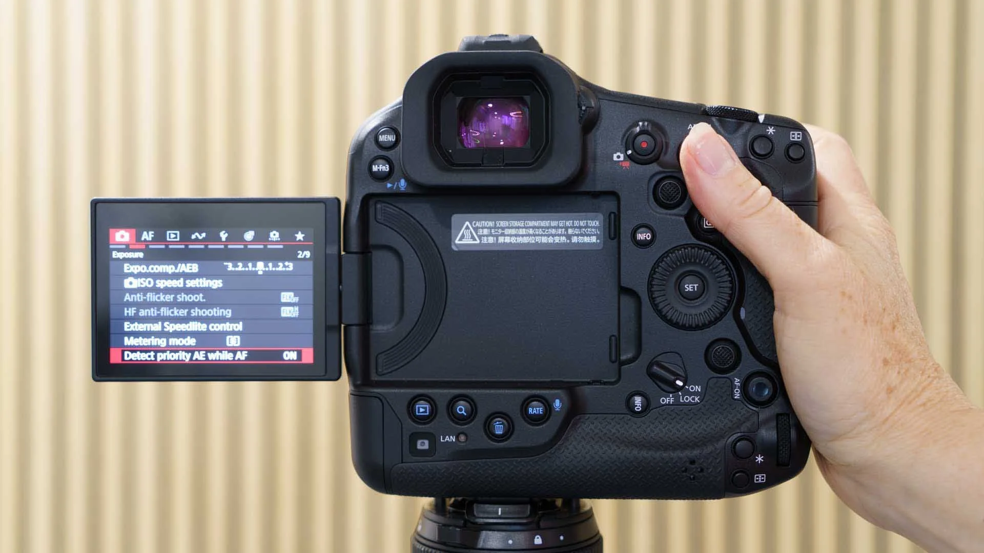  The Canon R1 is a large camera with two deep, comfortable grips. The controls on the right side of the back of the camera are all within fairly easy reach, although big hands are an advantage. My thumb is on the AF-On button in this image. 