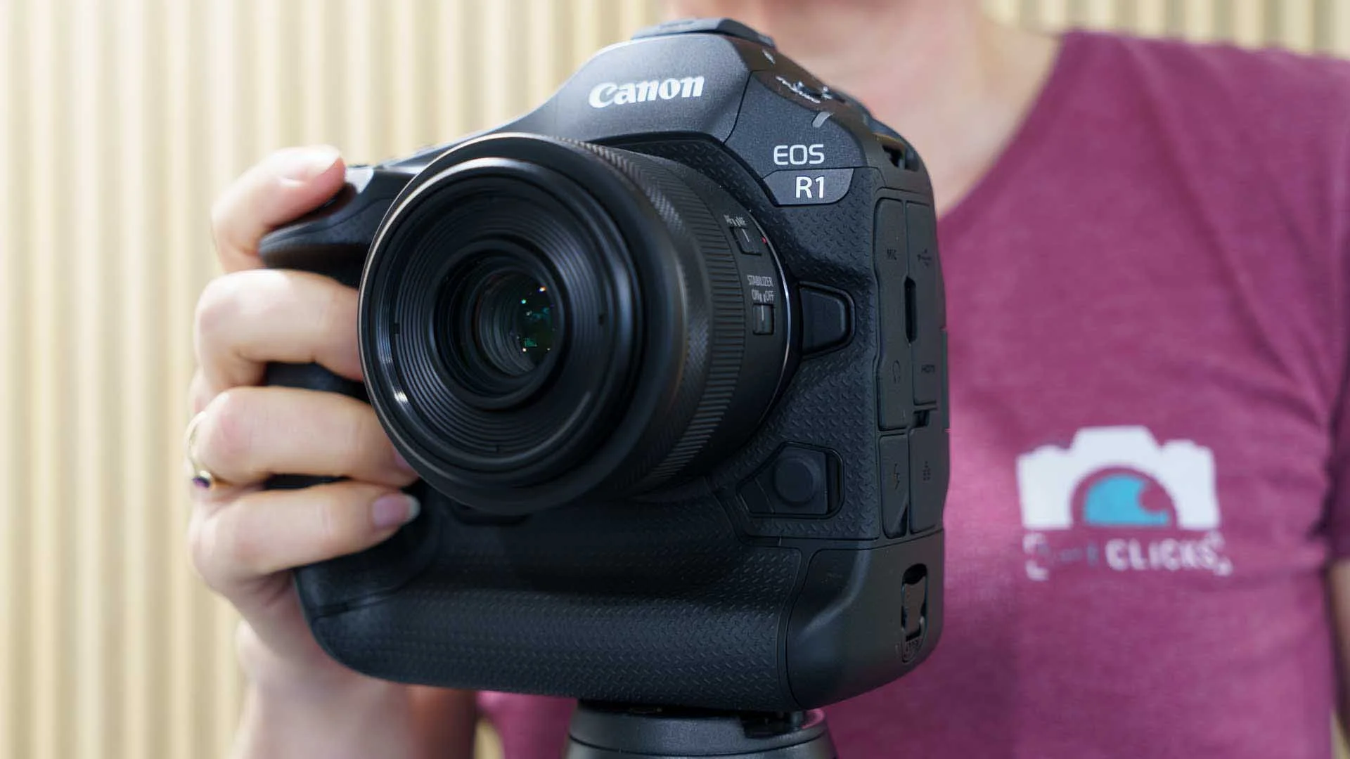  The Canon EOS R1 has a vertical and a horizontal grip.  