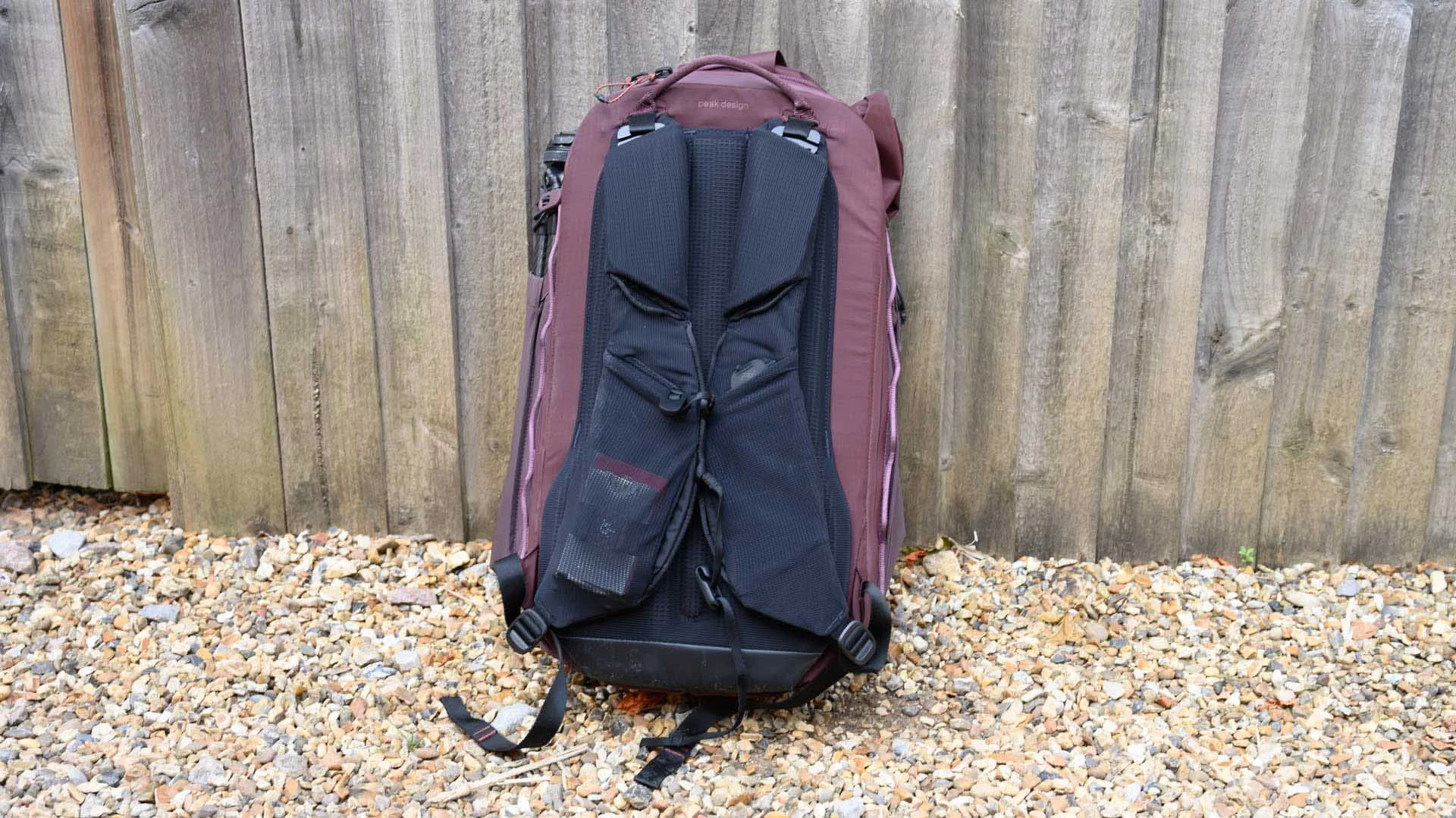 The main compartment of the Peak Design Outdoor Backpack 25L opens from the back with a zip going around the outer edge of the sides and top of the bag.