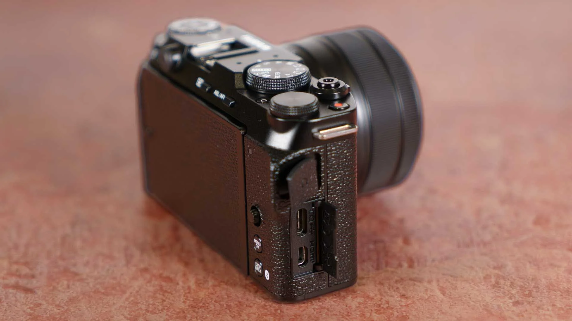  Unusually, the charging port, headphone socket and micro HDMI port are the right side of the Fujifilm X-M5. 