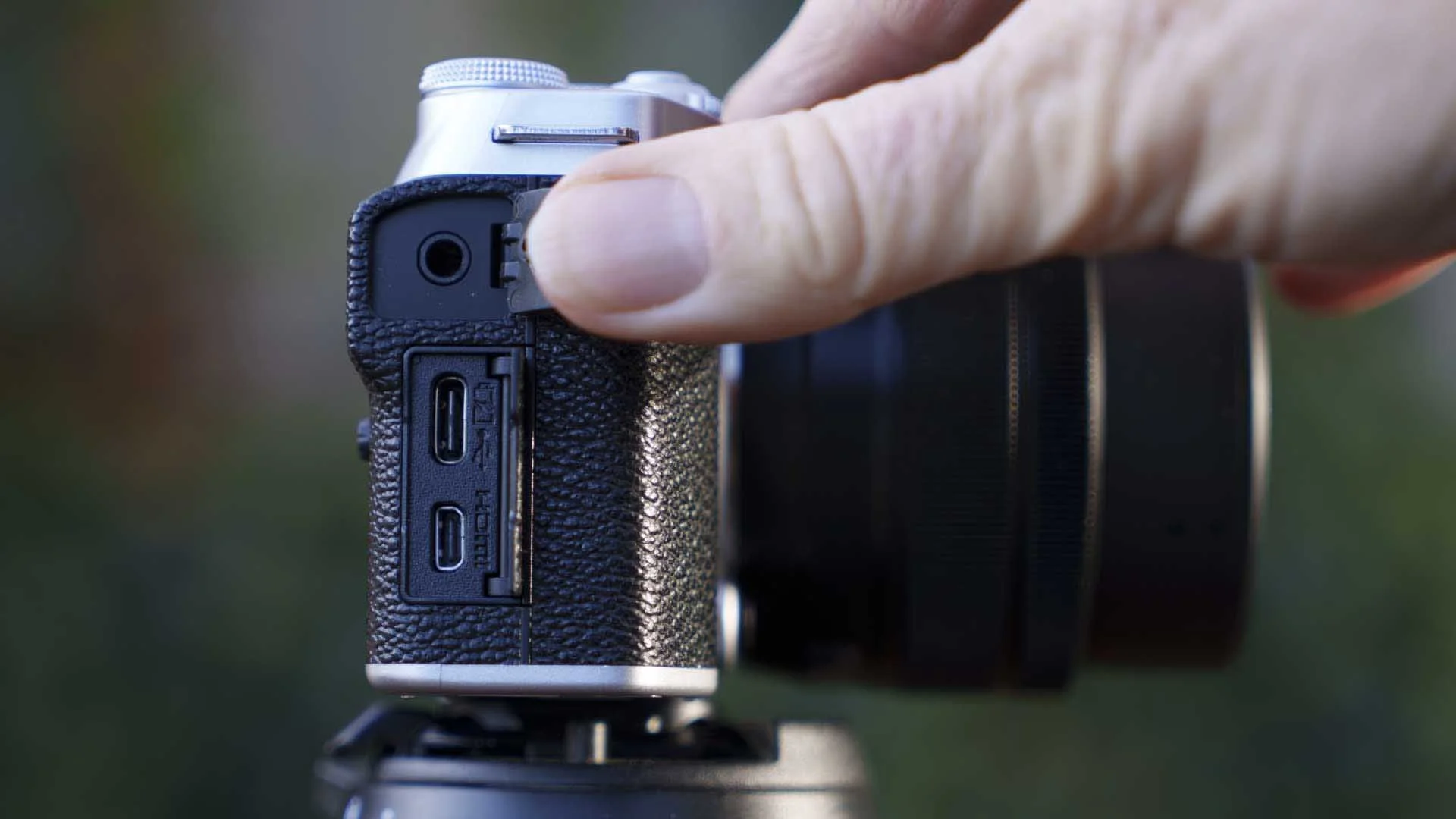  The X-M5’s headphone socket, charging port and micro HDMI ports (from the top down) are on the right side of the camera as you hold it for use.  