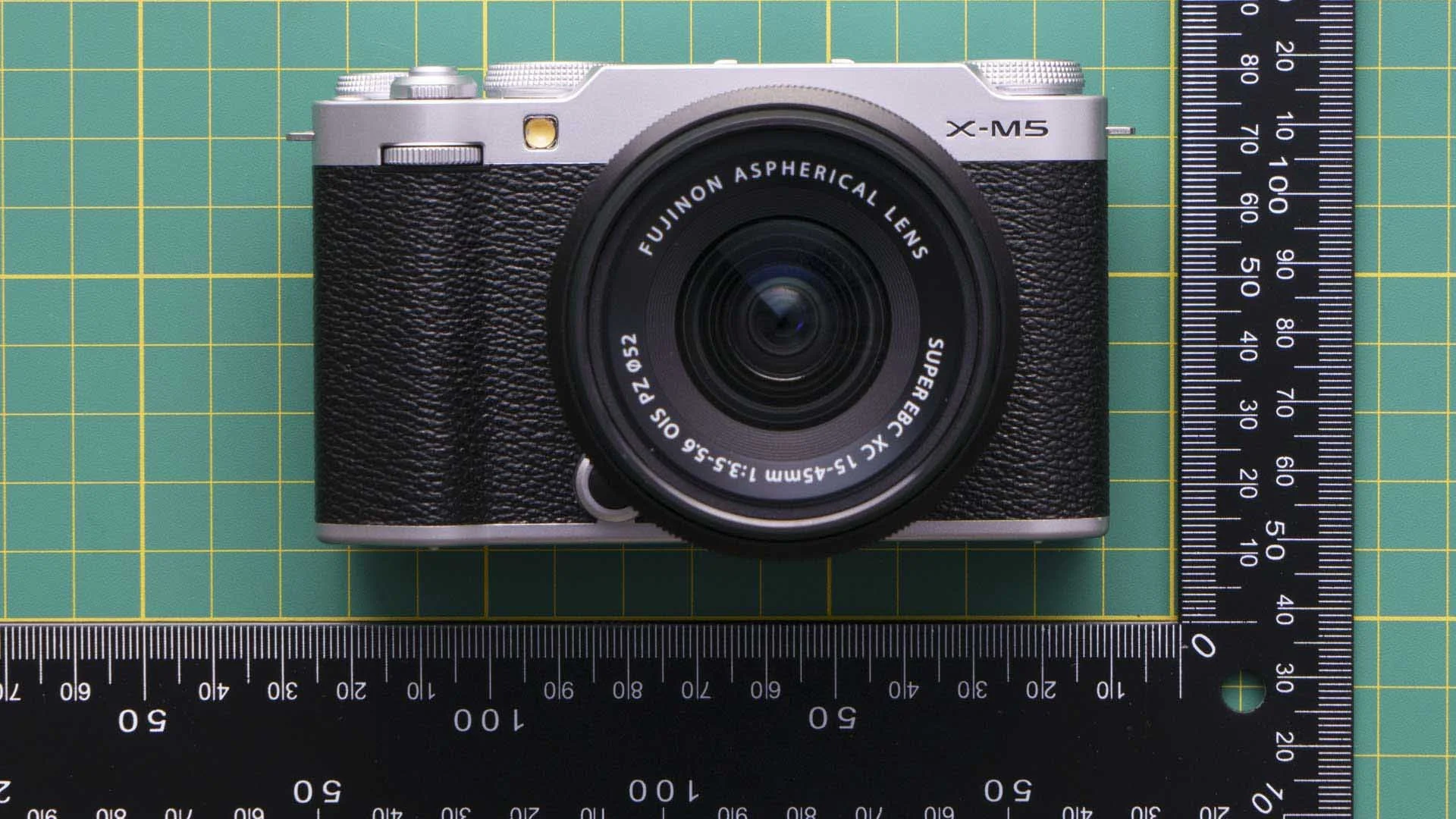  The Fujifilm X-M5 is a small and light mirrorless camera with a flat-top and no viewfinder. 