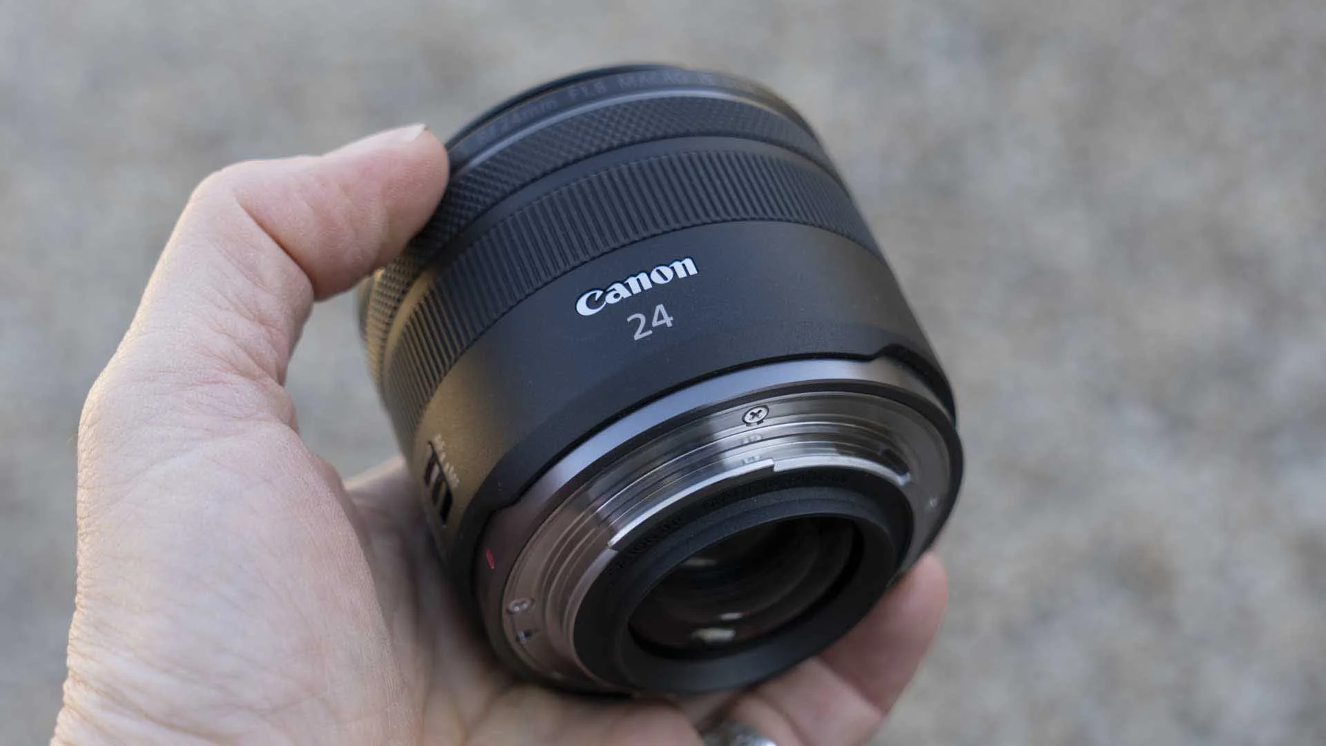 It’s not weather-sealed but the Canon RF 24mm f/1.8 Macro IS STM has a metal mount.