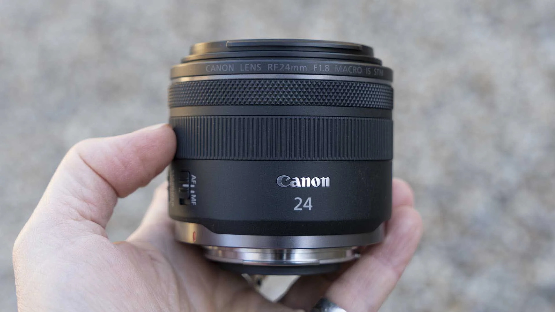 The customisable control ring has a knurled texture while the broader manual focus ring is ridged.