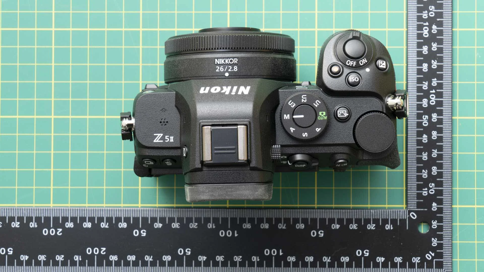 Nikon has given the Z5 II (shown here with the tiny Nikkor Z 26mm F/2.8 lens) a deeper grip than the original S5 to make the new camera more comfortable to use with long lenses.