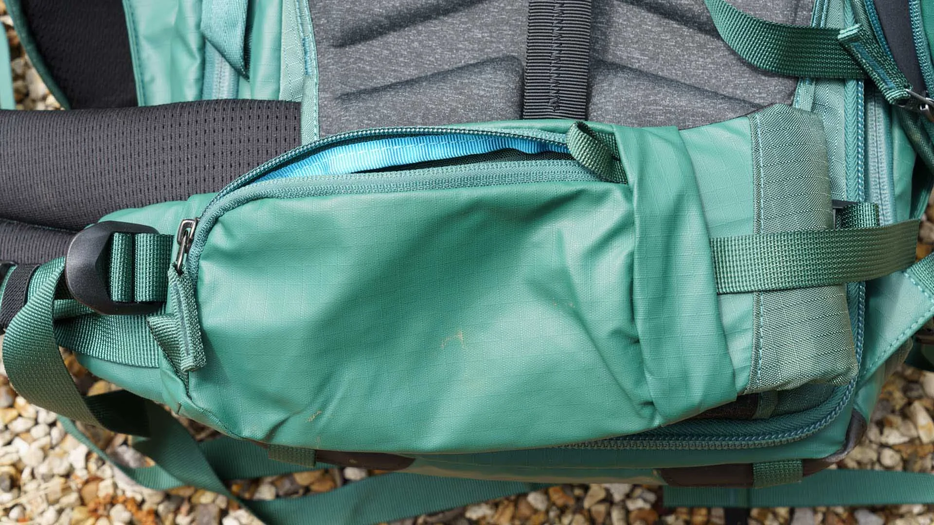  The left side (as you wear it) of the waist belt has a useful zip-close pocket that perfect for holding your purse and/or phone - it means you don’t hve to take the pack off if you want to pay for something. 