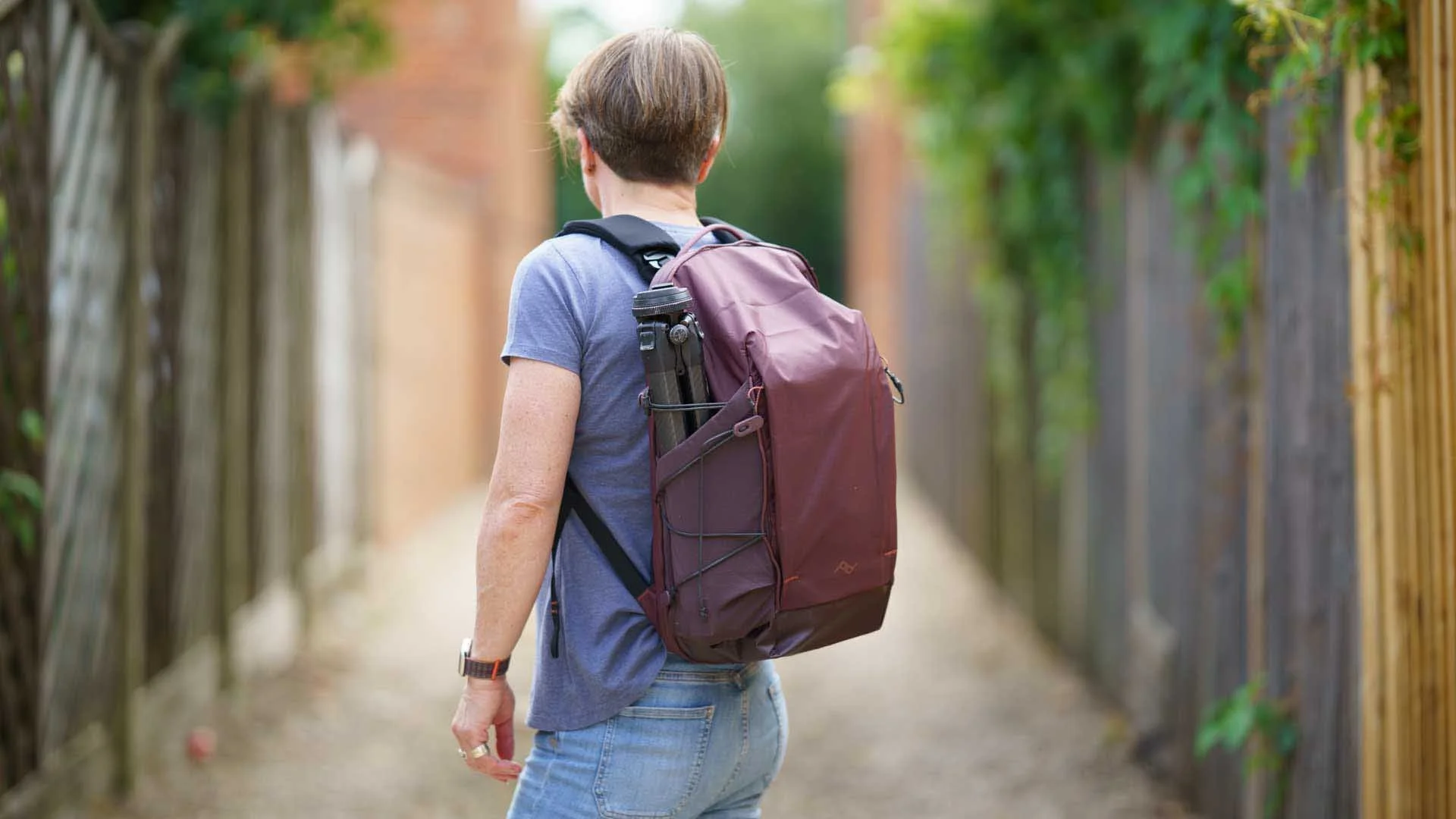  There’s a deep stretchy pocket on either side of the backpack. They are perfect for carrying a tripod (the Peak Design Travel Tripod fits especially well), a water bottle, wine bottle or sunscreen etc. 