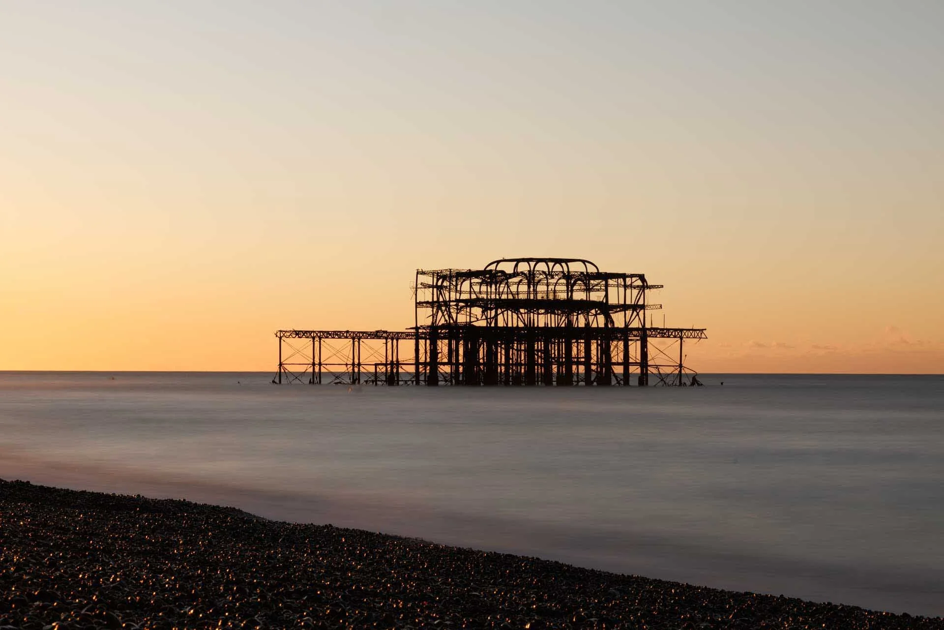  I used a neutral density filter and f/16 aperture to extend the shutter speed to 30 seconds so the water would blur in this image. The pier is nice and sharp. Image Credit: Angela Nicholson, Camera: Canon EOS R5 Mark II, Lens: Canon RF 85mm F1.4L VCM at 30 sec, f/16 and ISO 100. 