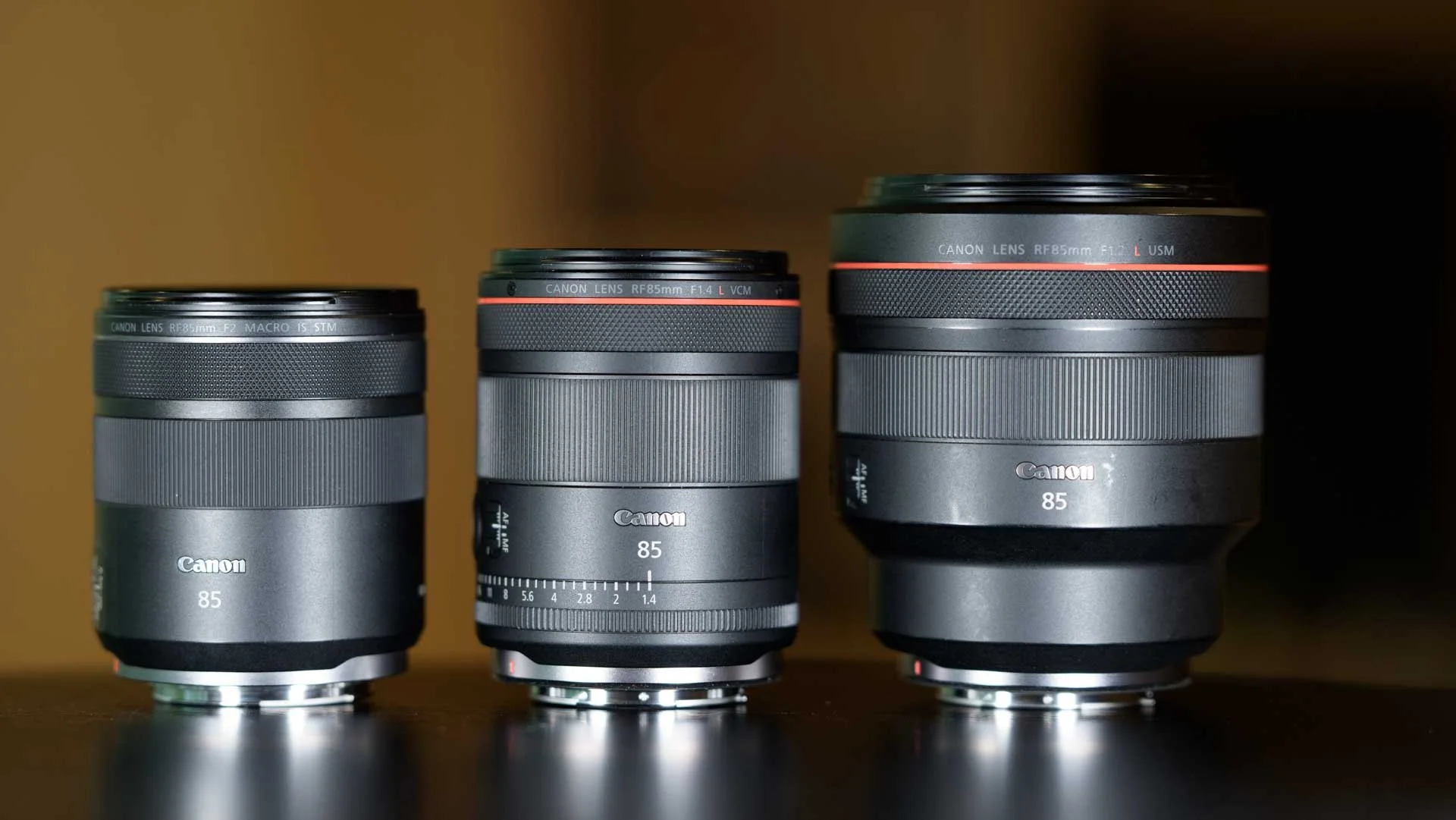  From left to right, the Canon RF 85mm f2 IS Macro STM Lens, the new Canon RF 85mm F1.4L VCM and the Canon RF 85mm f1.2L USM lenses. 