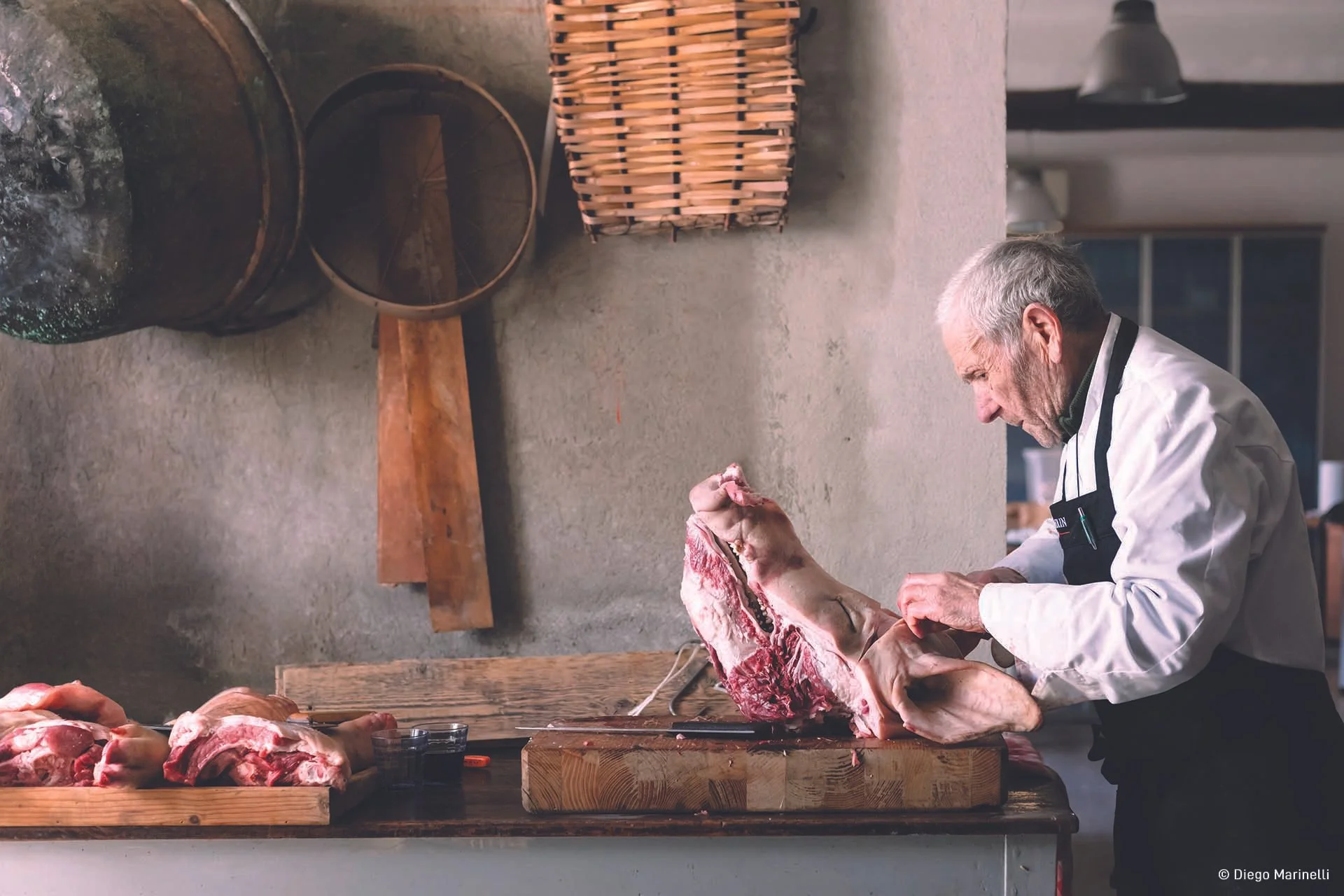  Image credit: Diego Marinelli	The Pig's Testament	The killing of the pig is a real ritual of Italian rural culture. I was struck by the elderly man's sense of respect towards the sacrificed animal and I hope that the image makes us reflect on how man's relationship with food has changed in the last 70 years. 