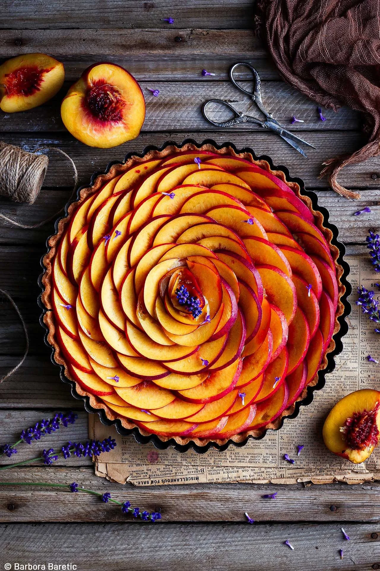  Image credit: Barbora Baretic	Summer Nectarine and Lavender Tart	The smell of lavender in my garden inspired me to create this photo. I believe the juicy nectarines complement the lavender well and the colours are complementary too: purple and yellow. 