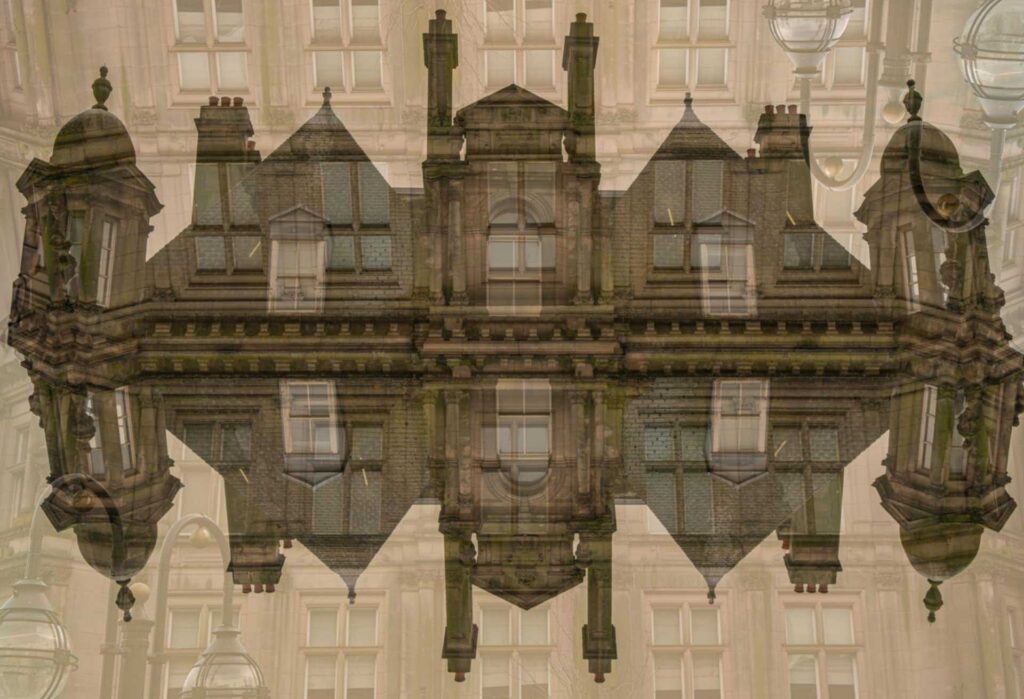 Multiple exposure of a Birmingham Victorian style building mirrored into a symmetrical pattern, layered with street lamps and pale architectural details.