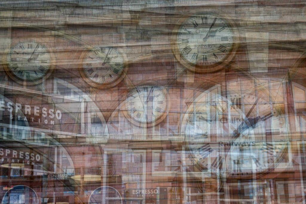 Multiple exposure of Birmingham New Street station clocks layered over the Espresso Station frontage, creating a busy, time themed abstract city scene.