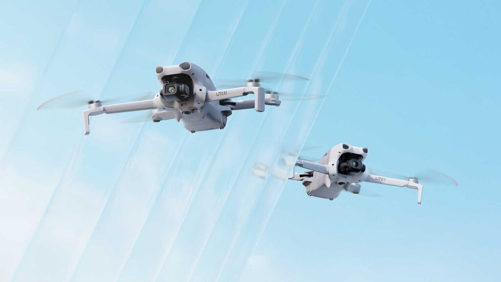 two small DJI drones agains a blue sky with a banding effect applied