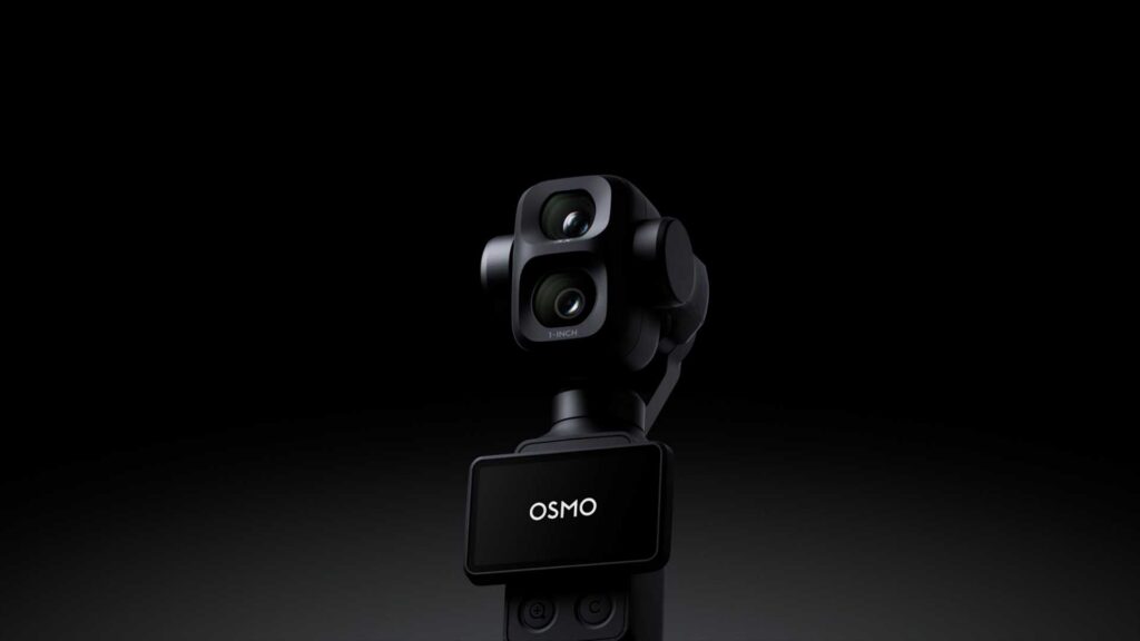 Black DJI Osmo Pocket 4P camera with dual lenses mounted on a handheld gimbal against a dark background. The screen displays the word “OSMO.”