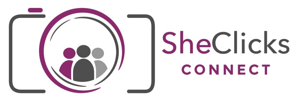 Logo for SheClicks Connect featuring three stylized people inside a circular camera lens graphic framed by camera brackets, with “SheClicks” in purple and grey and “CONNECT” below in burgundy uppercase text.