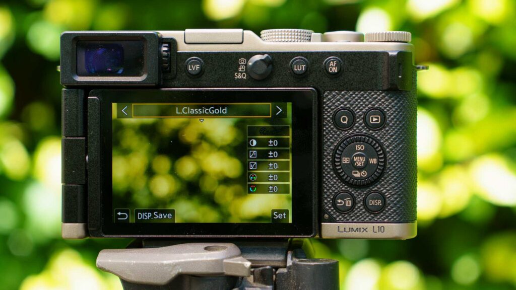 Rear screen of the Panasonic Lumix L10 showing the “L.ClassicGold” photo style settings menu.