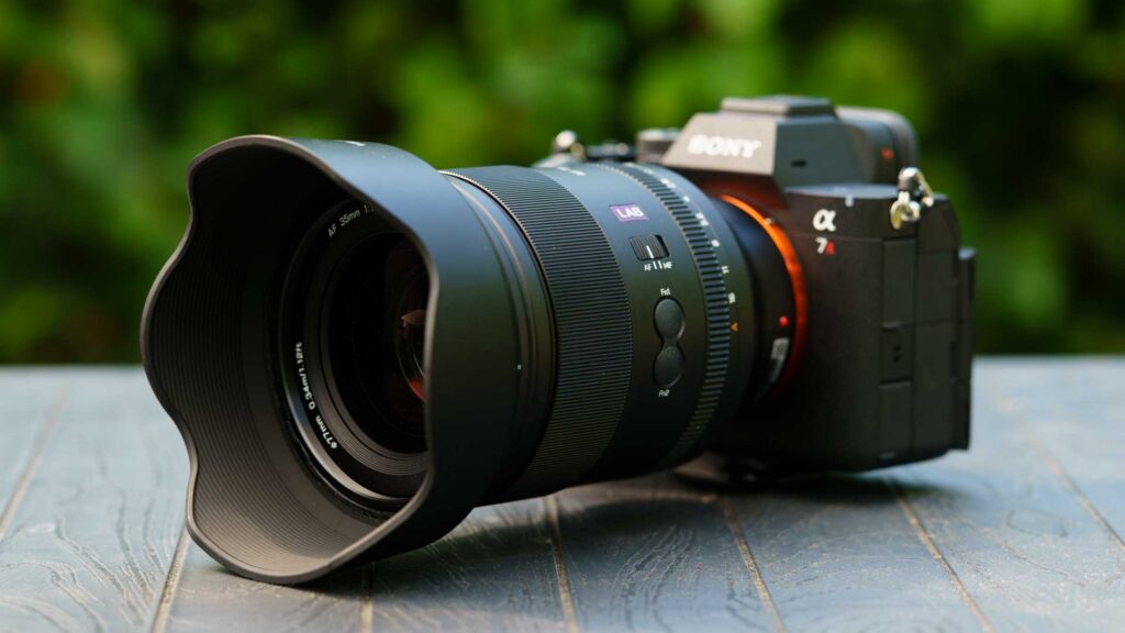 Front three-quarter view of the Viltrox AF 35mm F1.2 LAB FE mounted on a Sony Alpha 7R camera with its petal hood fitted.