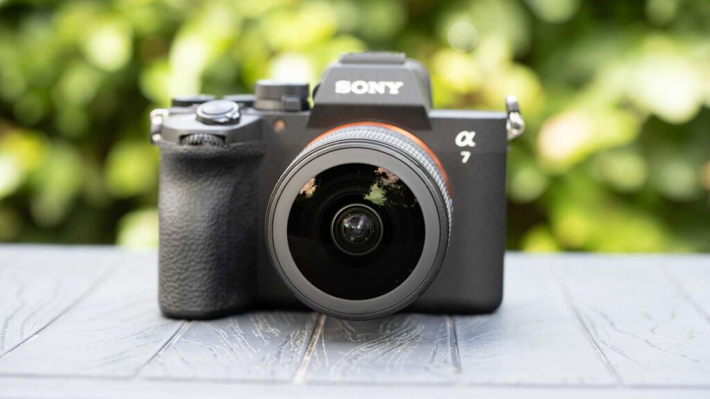 Front view of a Sony Alpha 7-series camera fitted with the FE 8-14mm F3.5 Fisheye G, with its bulbous front element prominent.