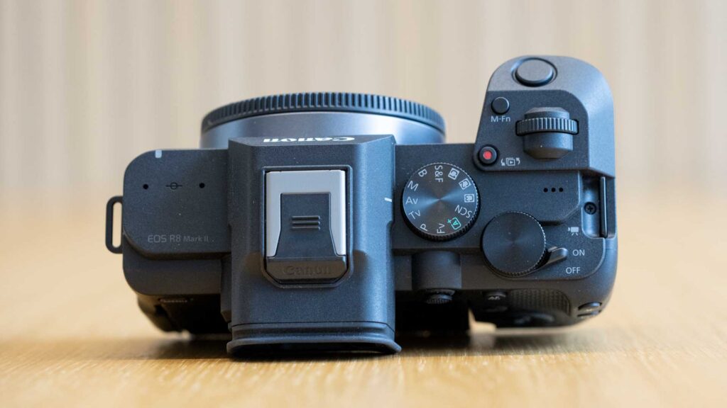 Top view of the Canon EOS R8 Mark II showing the hot shoe, mode dial, control dial, shutter button and power switch.