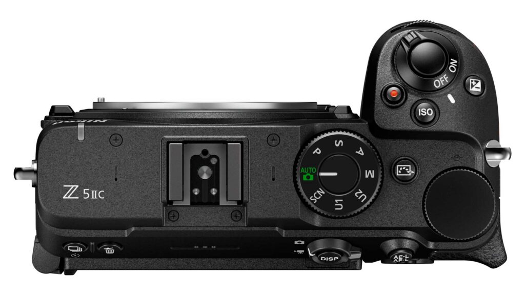 Top view of the black Nikon Z5IIC body, showing its hot shoe, mode dial, shutter button and control dial.